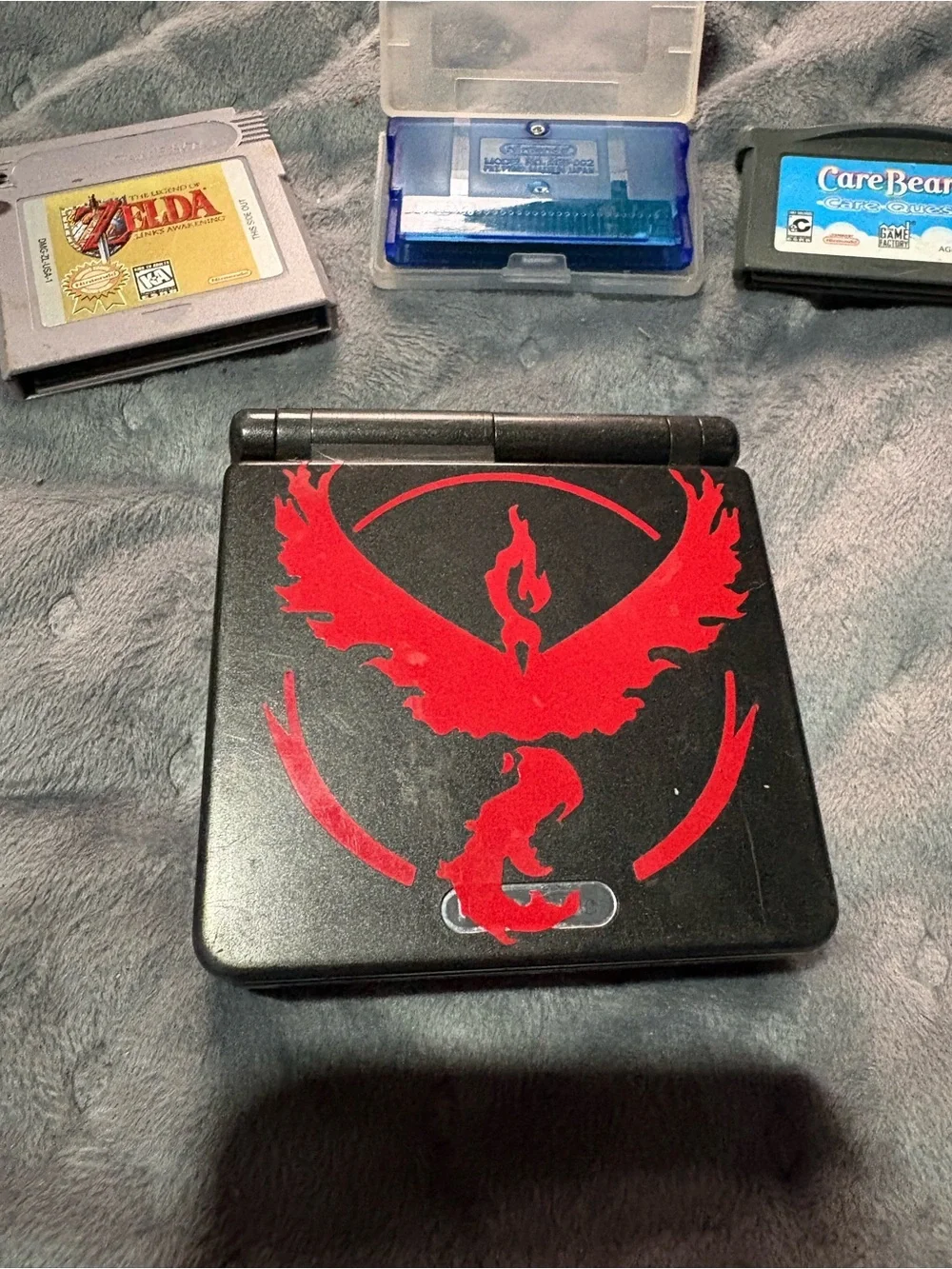 Nintendo Game Boy Advance SP Black with Pokémon sapphire, Zelda, Care Bears